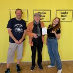 Bei Radio Köln eingerahmt von Moderator Daniel Sollmann und Kristina Sczesny